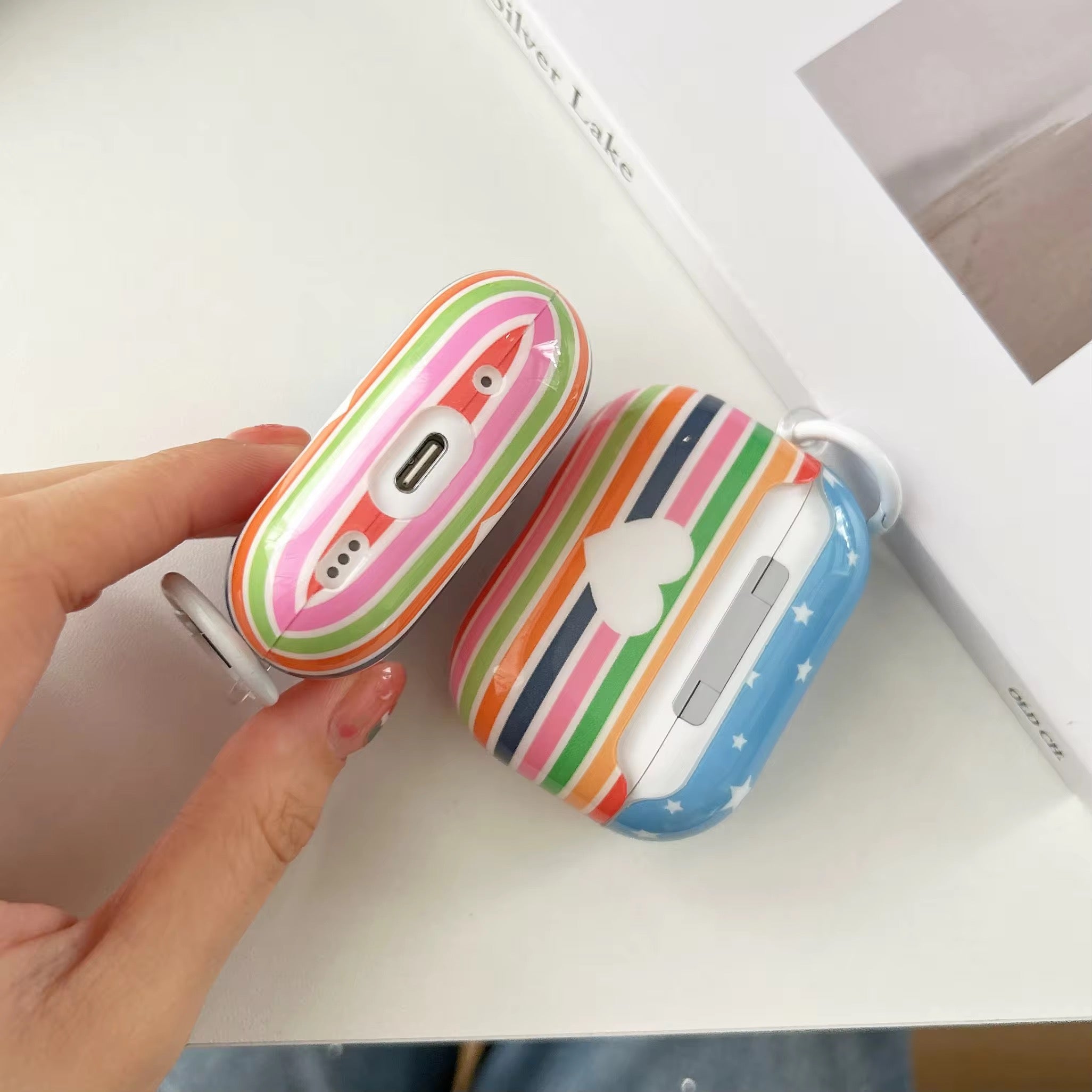 Multicolor Striped Heart Glossy Airpod Pre-Order Case With Ring