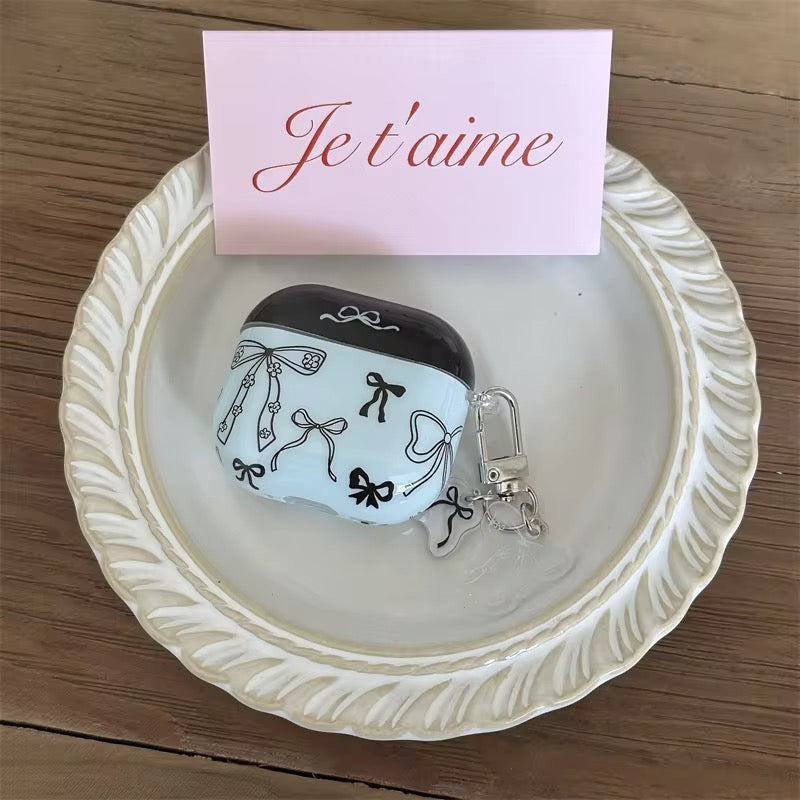 Trendy Blue Black Bow Airpod Glossy Case With Hanging